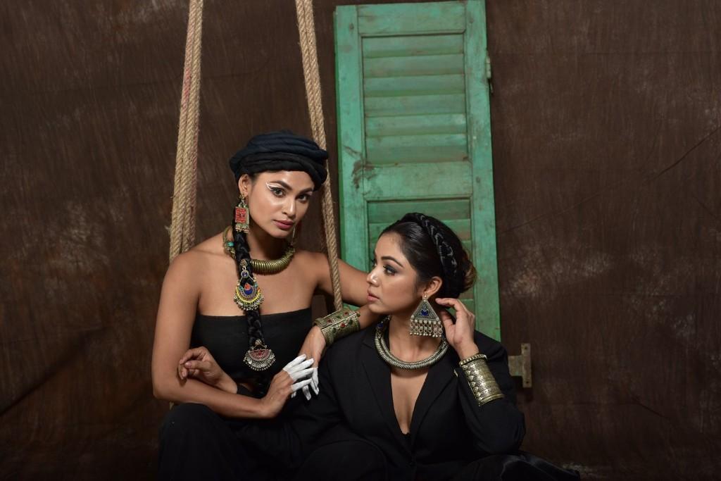 Riwaiyat statement jewellery worn in a studio portrait